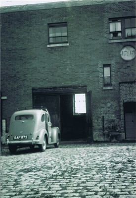 Photo:The Watts family car parked below their flat around 1953